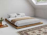 wooden low attic bed in honey