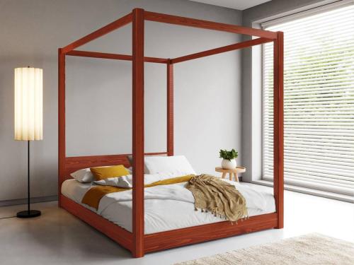 red wooden low four poster bed by get laid beds