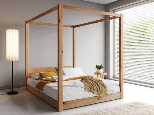low four poster wooden bed in honey by get laid beds