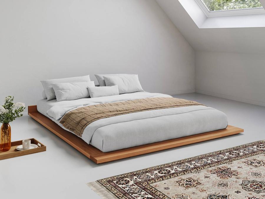 low wooden attic bed in cinnamon